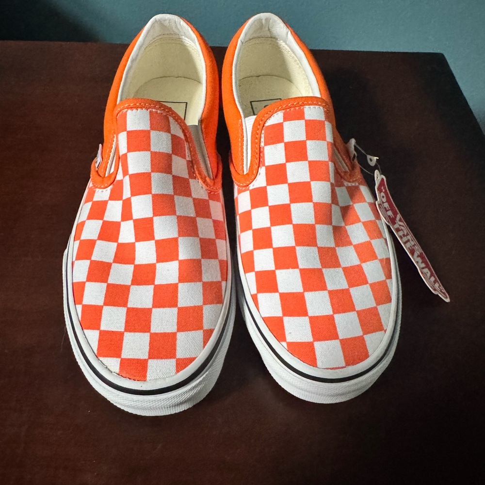 Vans Orange and White Checkerboard Slip-On Sneakers